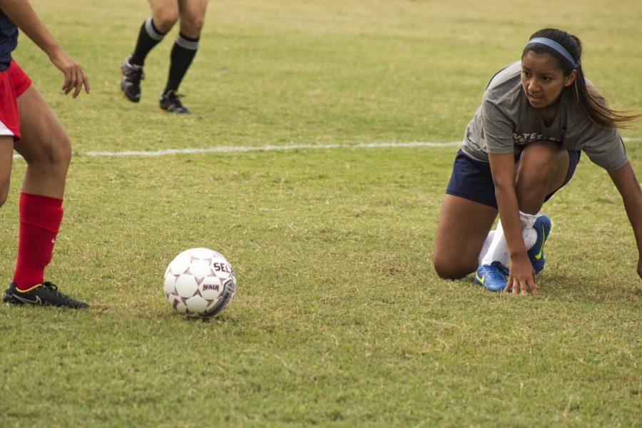 Lauren Marquez regains her footing after performing a slide tackle against Hill College.