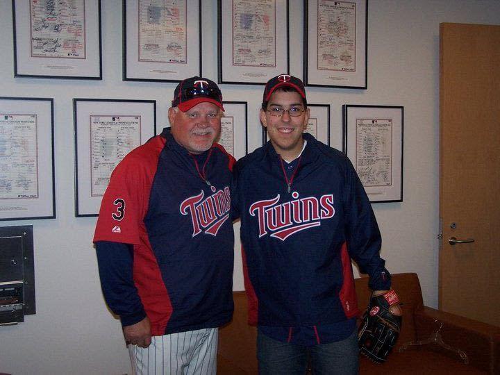 Ron Gardenhire, former manager of the Minnesota Twins, and Michael Acosta pose for a picture after trading baseball knowledge. 