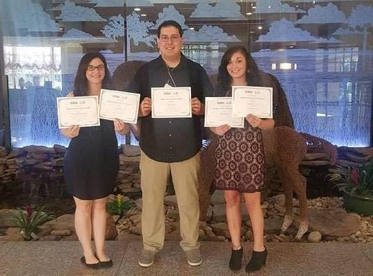 Valerie Spears [left], Michael Acosta [middle], and Brianna Kessler [right] at the society of Professional Journalists Region 8 Mark of Excellence Conference.