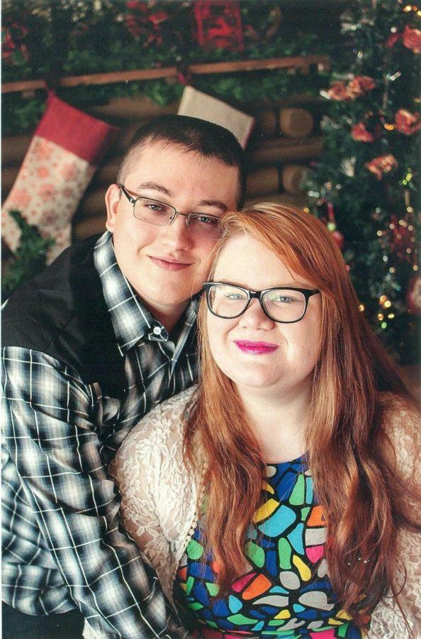 Content producer Shaydi Paramore poses with her fiance, Robert Clary, for a Christmas photo.