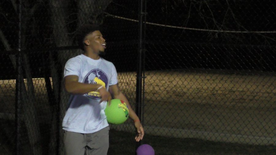 Diamond Williams, a junior psychology major and defensive back on the Rams football team, works to outsmart the enemy at Wednesday nights dodgeball event. 
Photo by Matt Smith 