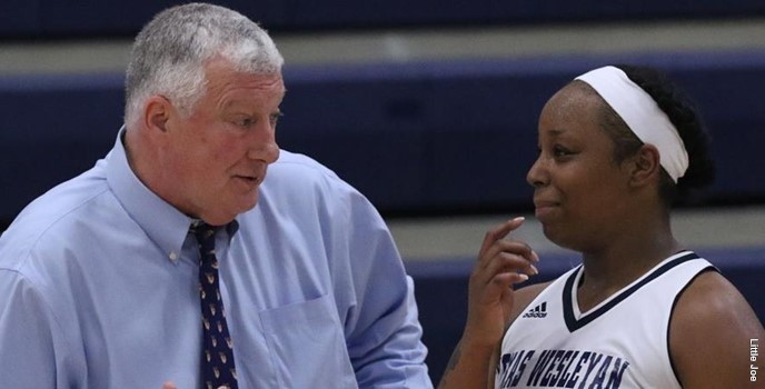 Head coach Bill Franey (left) speaks with the only three-time All-American in program history, Katelynn Threats, during an 83-58 win over University of Science & Arts Oklahoma on Feb. 11.