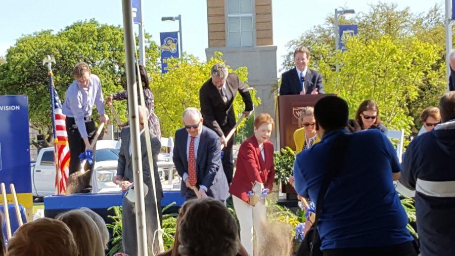 Texas Wesleyan President Frederick Slabach watches as major donors turn soil for the new student center.
Photo by Amanda Roach