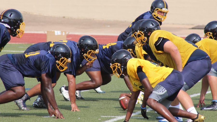 Rams players face off at practice at Farrington Field last week.
Photo by Tina Huynh