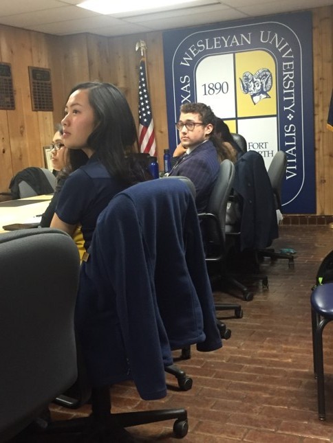 Phuong Le and other SGA members discuss amendments to the constitution at Fridays meeting.
Photo by David Cason