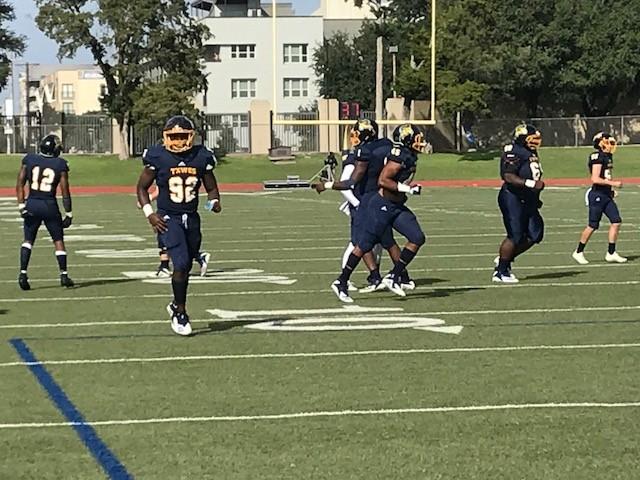 Defensive end Michael Richardson (No. 92) runs off the field after a play during the Rams victory over Lyon College on Saturday.
Photo by Ashton Willis  