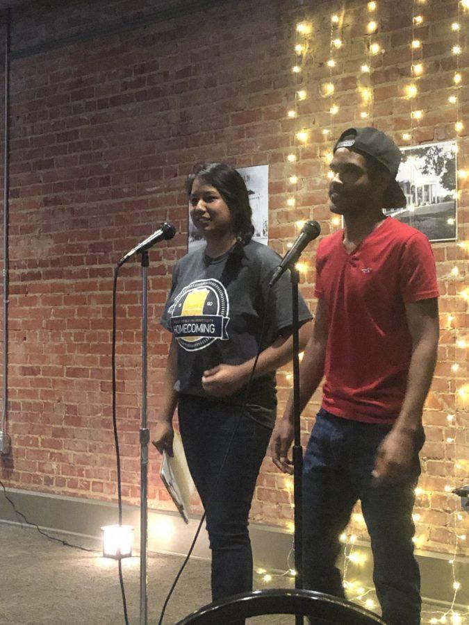 Open Mic Night co-hosts Nikita Dhoubhadel and Akeel Johnson prepare the crowd for the Naked But Real open mic night on Monday.
Photo by Davonte Mitchell-Dixon.