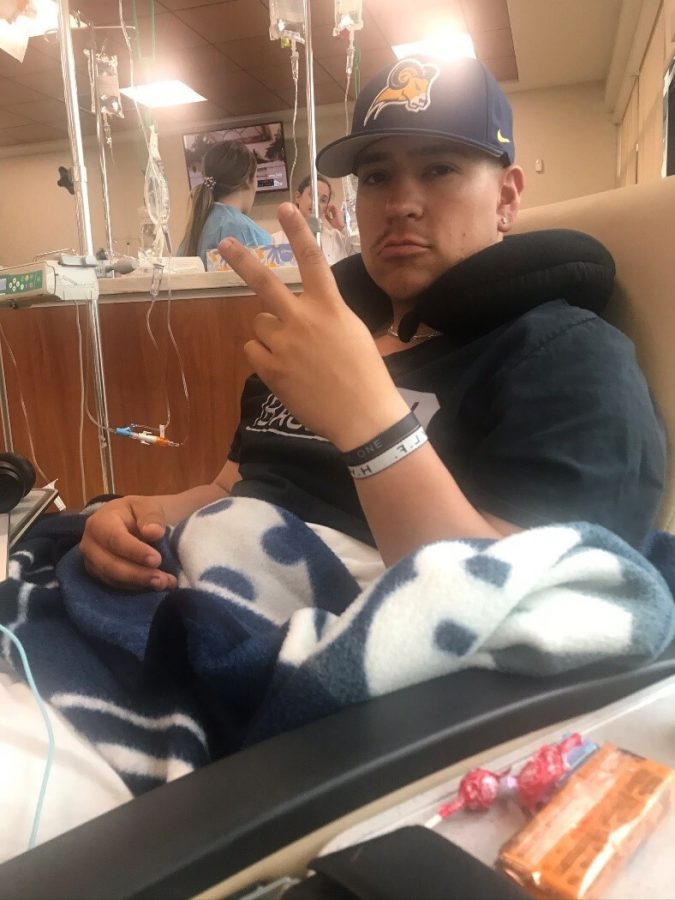 Matthew Espinoza hooked up to a chemo treatment at Texas Oncology in Keller this spring. Espinoza and his family received good news about his cancer in late April. Photo courtesy of Matt Espinoza.