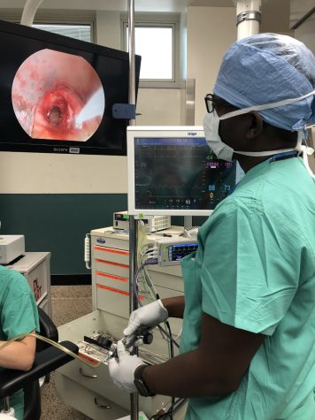 SRNA Yannick Macaulay performs jet ventilation on a patient with severe subglottic stenosis at Denver Health Level 1 Trauma Center, according to the AANA journal issue of Oct. 2021.