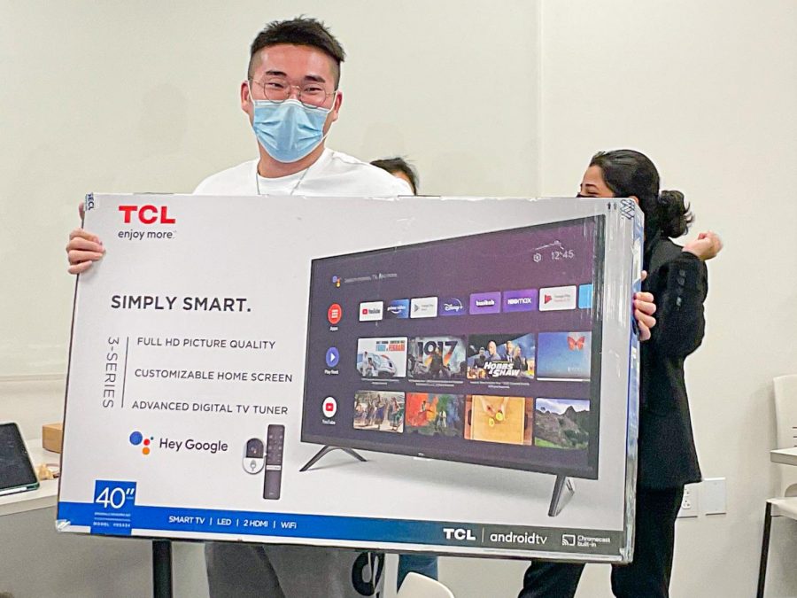 At the end of the debate, Junjie Dai was one of the lucky winners of the raffle for prizes which ranged from polaroid cameras, mini-refrigerators, microwaves, to smart television sets. Dai won the television.
