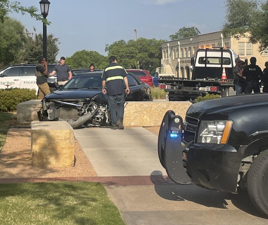 Fort Worth Police inspected the crashed vehicle.