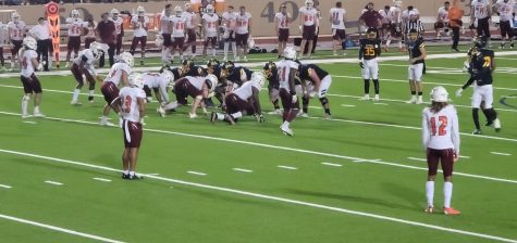 The Rams and Spirit get ready to execute a play during the game.