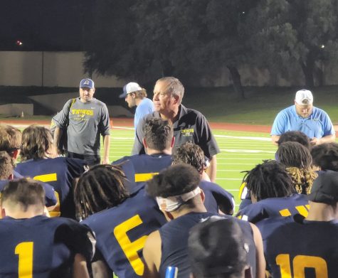 Head Coach Joe Prud’Homme gives a speech to his players after their win against Oklahoma Panhandle State.
