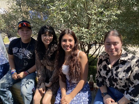 First-year psychology major Danna Cabral and her friends attend the Mariachi Oro Azul performance.  