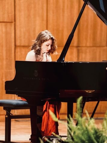 Zoe House uses the university’s Steinway Concert Grand Piano for her recitals.