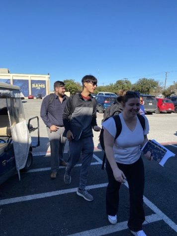 Students, faculty and staff wait outside the PUMC as the Texas Wesleyan University Facilities Department investigates the fire alarm that was pulled.