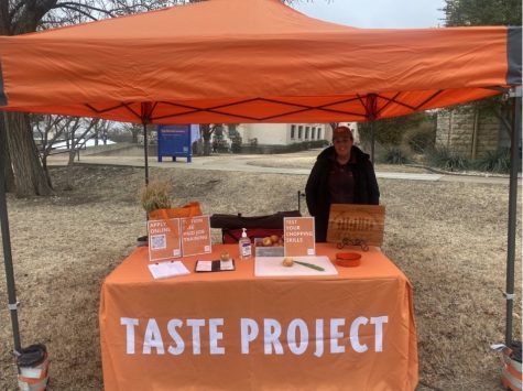 The Taste Project Board Vice President of External Affairs Julie Williams is smiling as she welcomes people to her stand that offers a dining experience to those who may not be able to afford traditional restaurant settings.