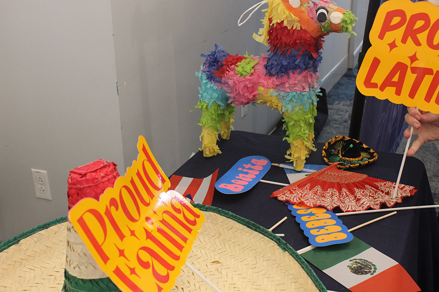 Students were encouraged to take photographs at the photo booth with these Hispanic props. 