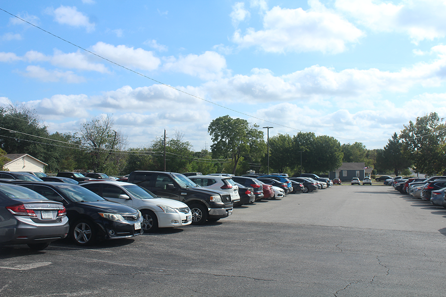 Parking lot E is packed with cars right before 11 a.m. During these busy class hours students spend extra time searching for spaces. 