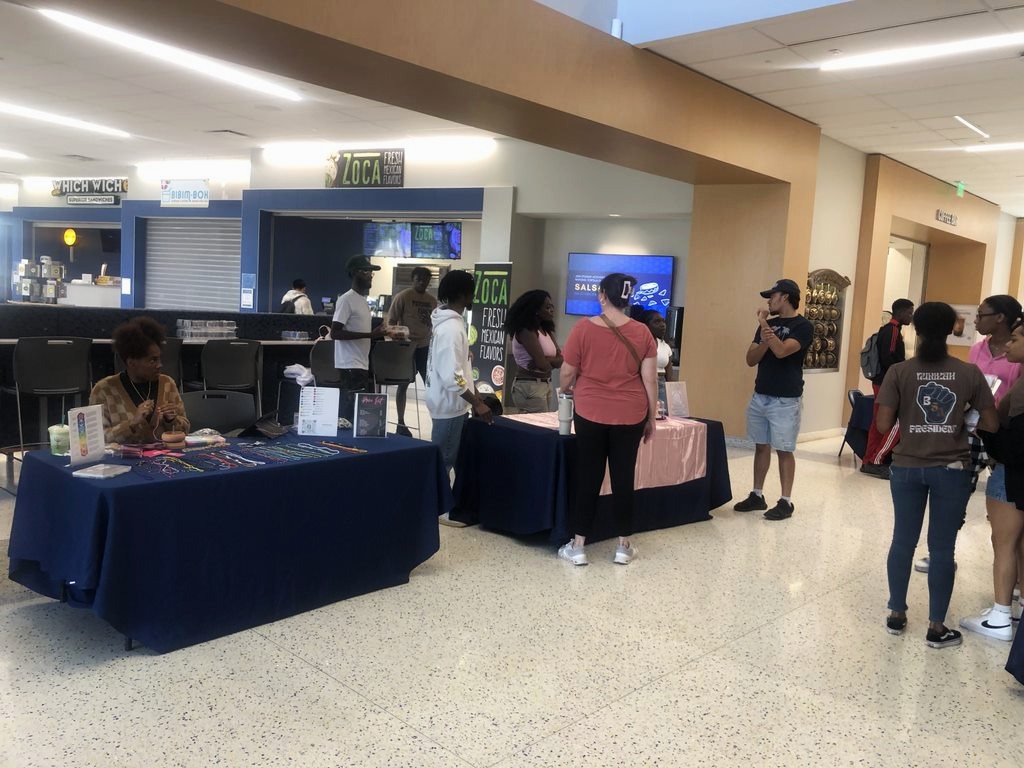 Student-led businesses showcase their products to attendees on the first floor of the Martin Center. 