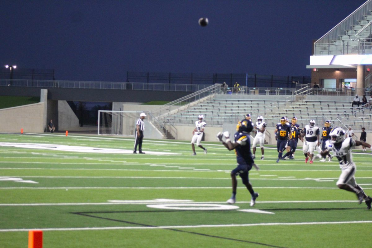 Rams wide receiver Michael Banks sprints to the corner for a deep ball reception.