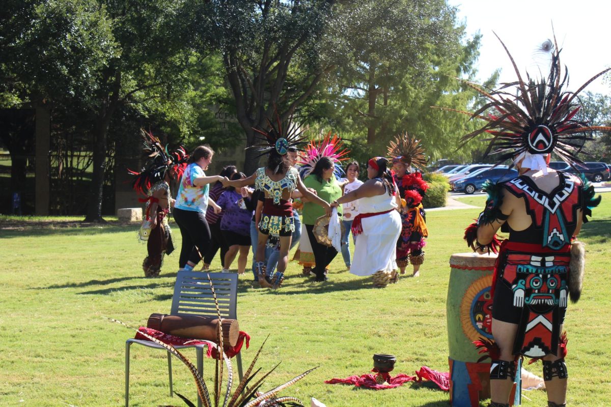 Participants joined the Danza group in the friendship dance. 