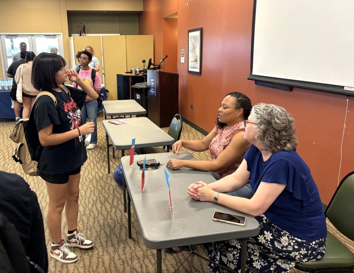 Wesleyan students discuss major and minor options with professors who encourage them to declare one.