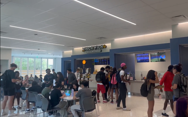 Students gather around on-campus dining options in Gina's Cafe located on the first floor of the Martin University Center (MUC).