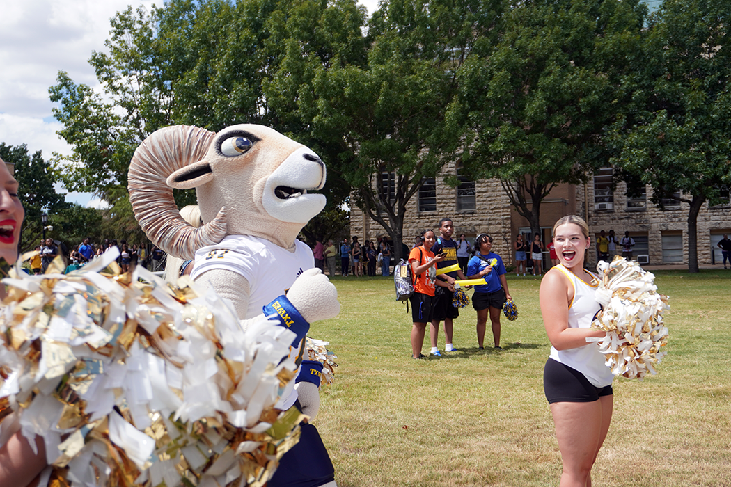 Willie The Ram joins the spirit teams in encouraging the crowd to cheer and shout for the Rams.  