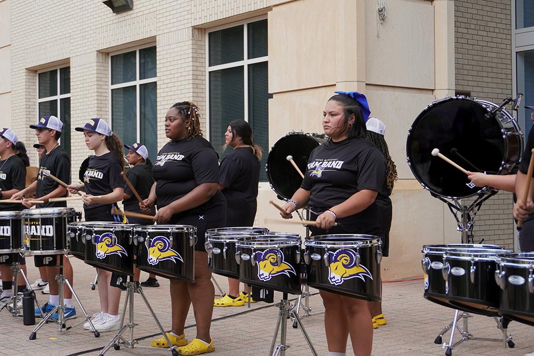 Musical performances by the Ram Band were directed by Dr. Thomas Willmann, director of instrumental activities, conducting and music education.  