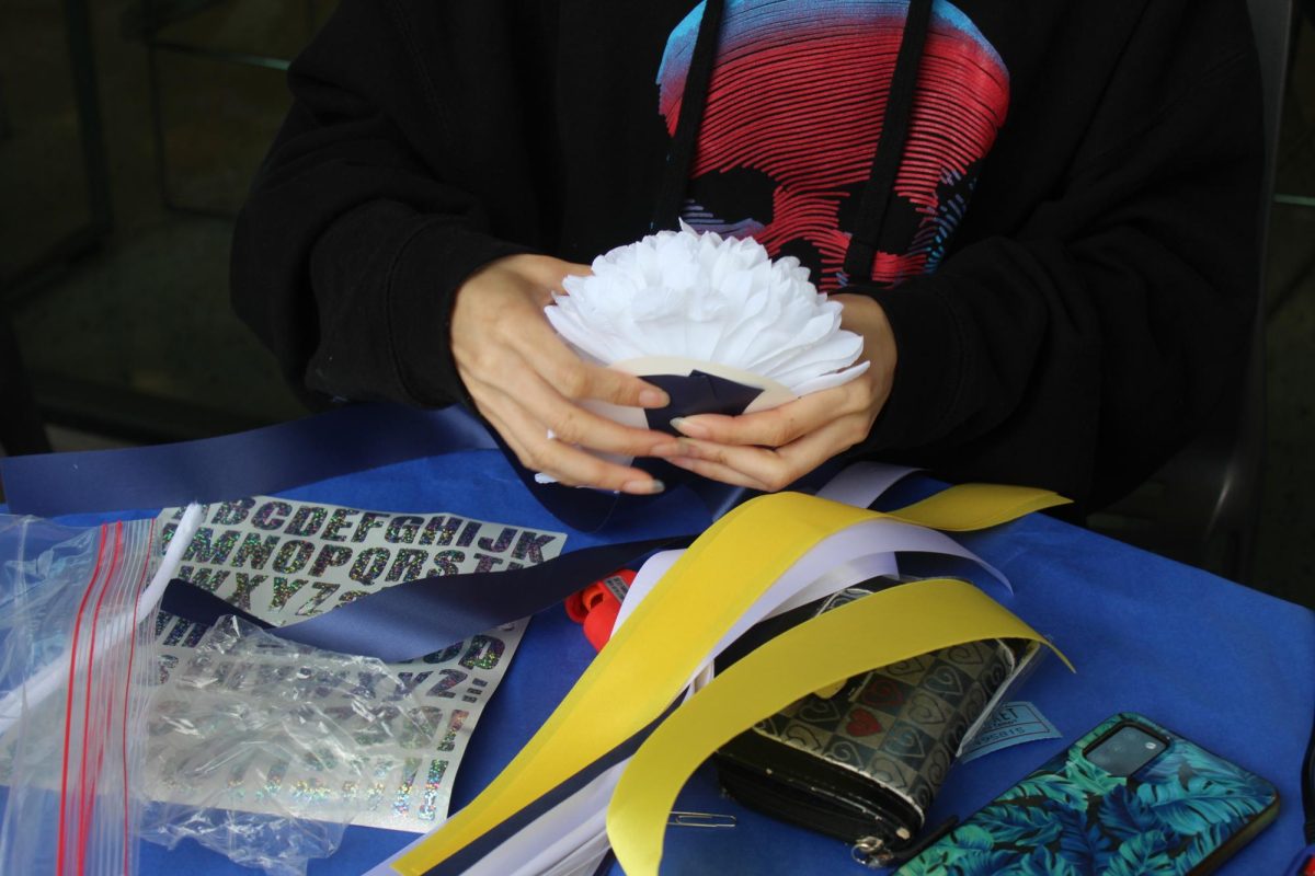 Students attending were given packages with the basic materials needed to craft either mums or megaphones. 