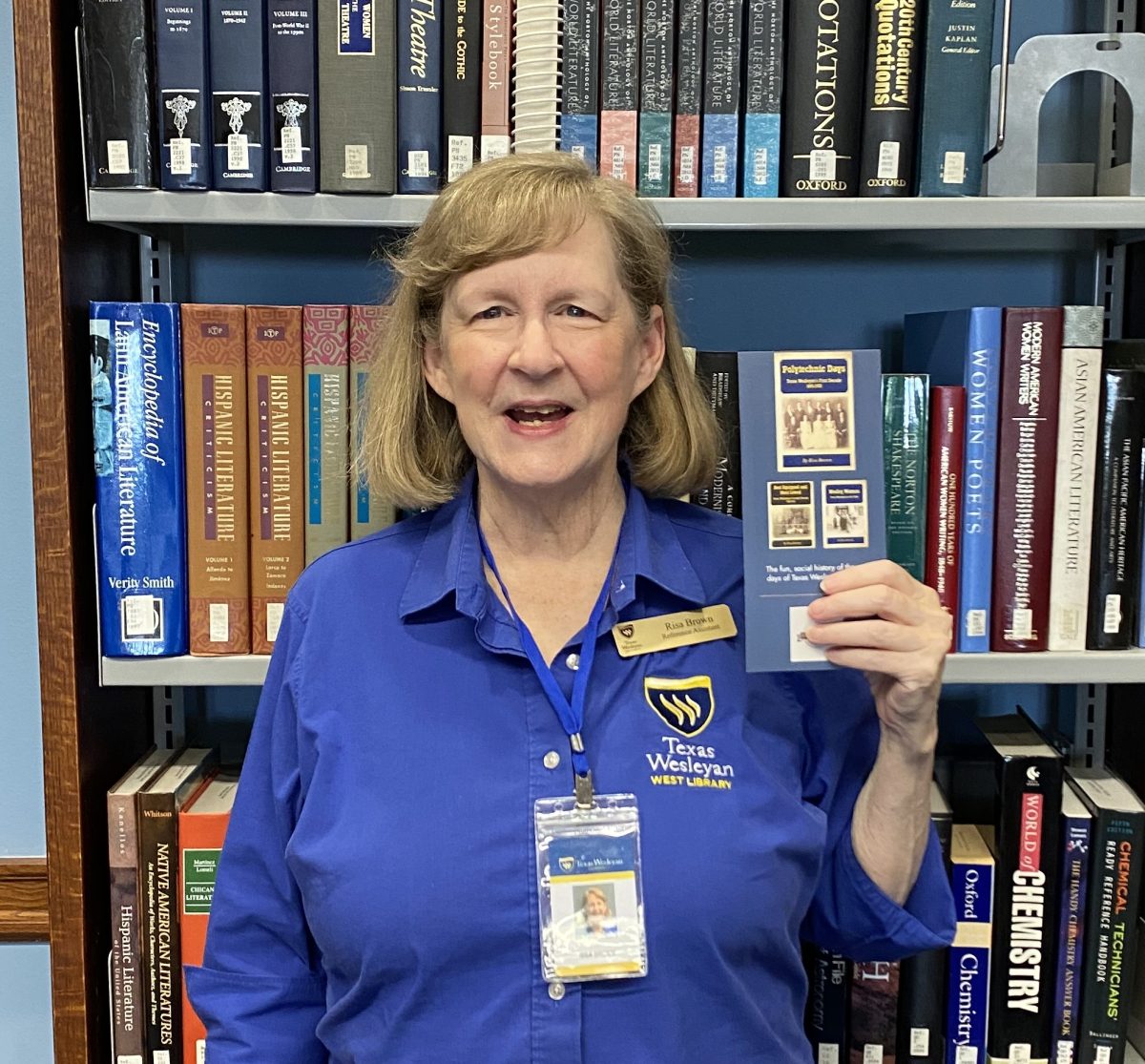 Risa Brown with the card of her new book Polytechnic Days: Texas Wesleyan’s Third Decade, 1910-1920. Photo courtesy Risa Brown