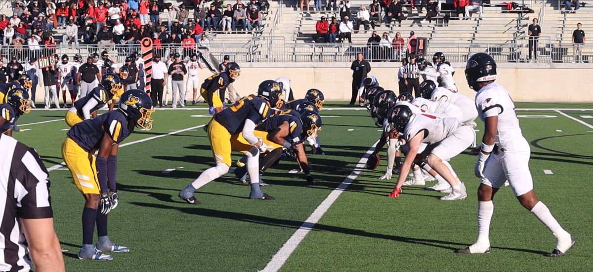  The Rams defensive line anticipates the ball being snapped.