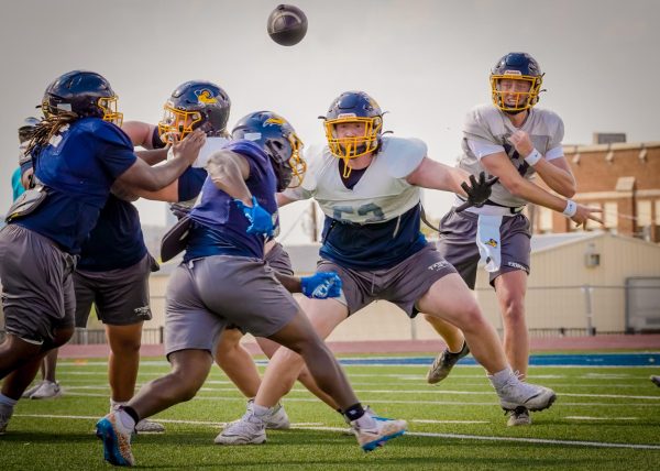 New plays unfold fast as the Rams test their skills in a spirited scrimmage as they prepare for the game ahead. 