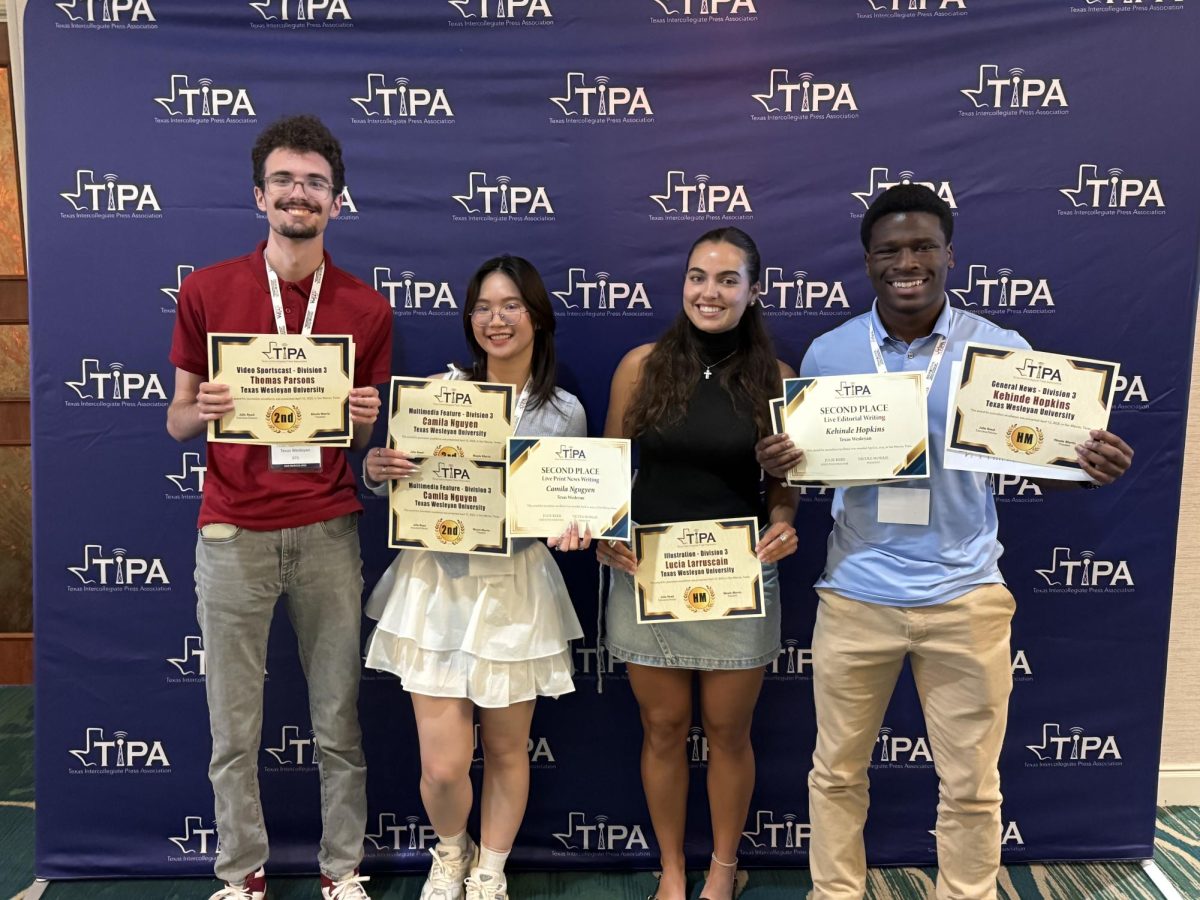 Rambler staff pose following the Texas Intercollegiate Press Association Convention award breakfast. [Photo courtesy Dr. Jenny Dean]
