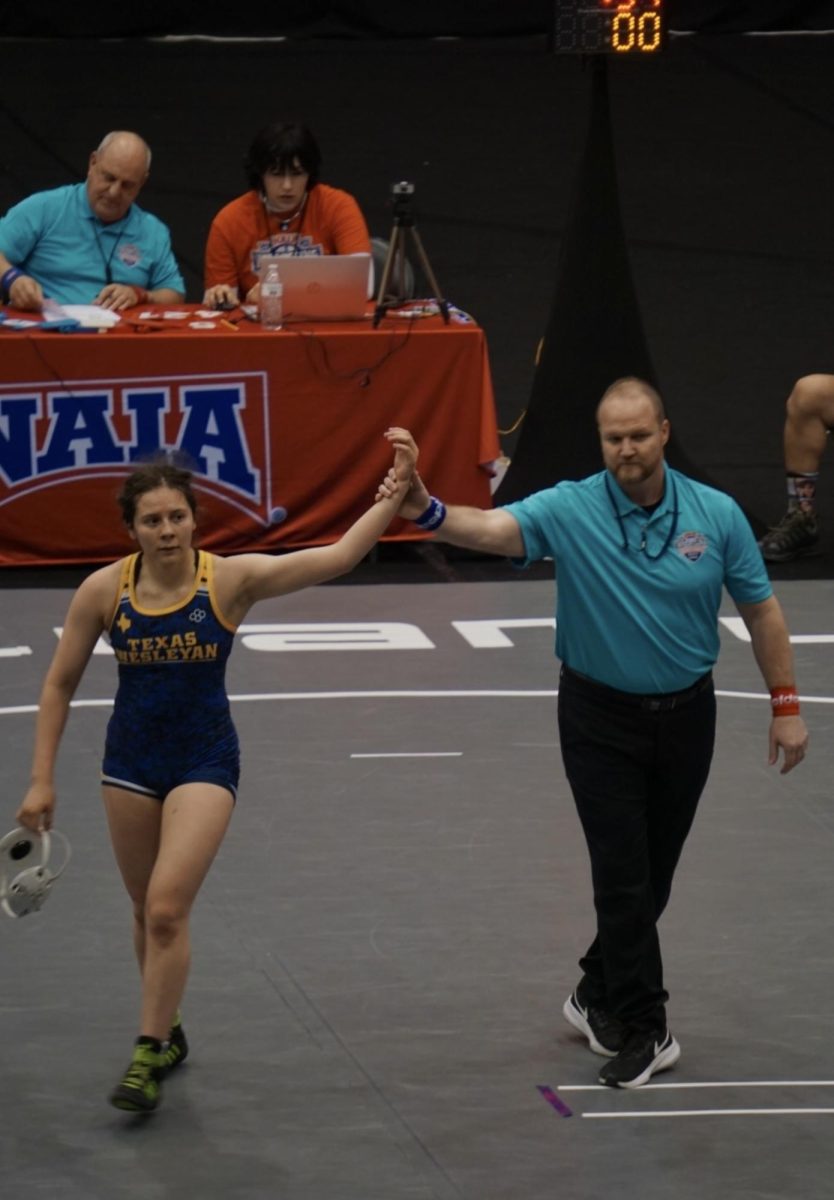 Samantha Barragan celebrates following victory in a bout. [Photo courtesy Tu Pha]