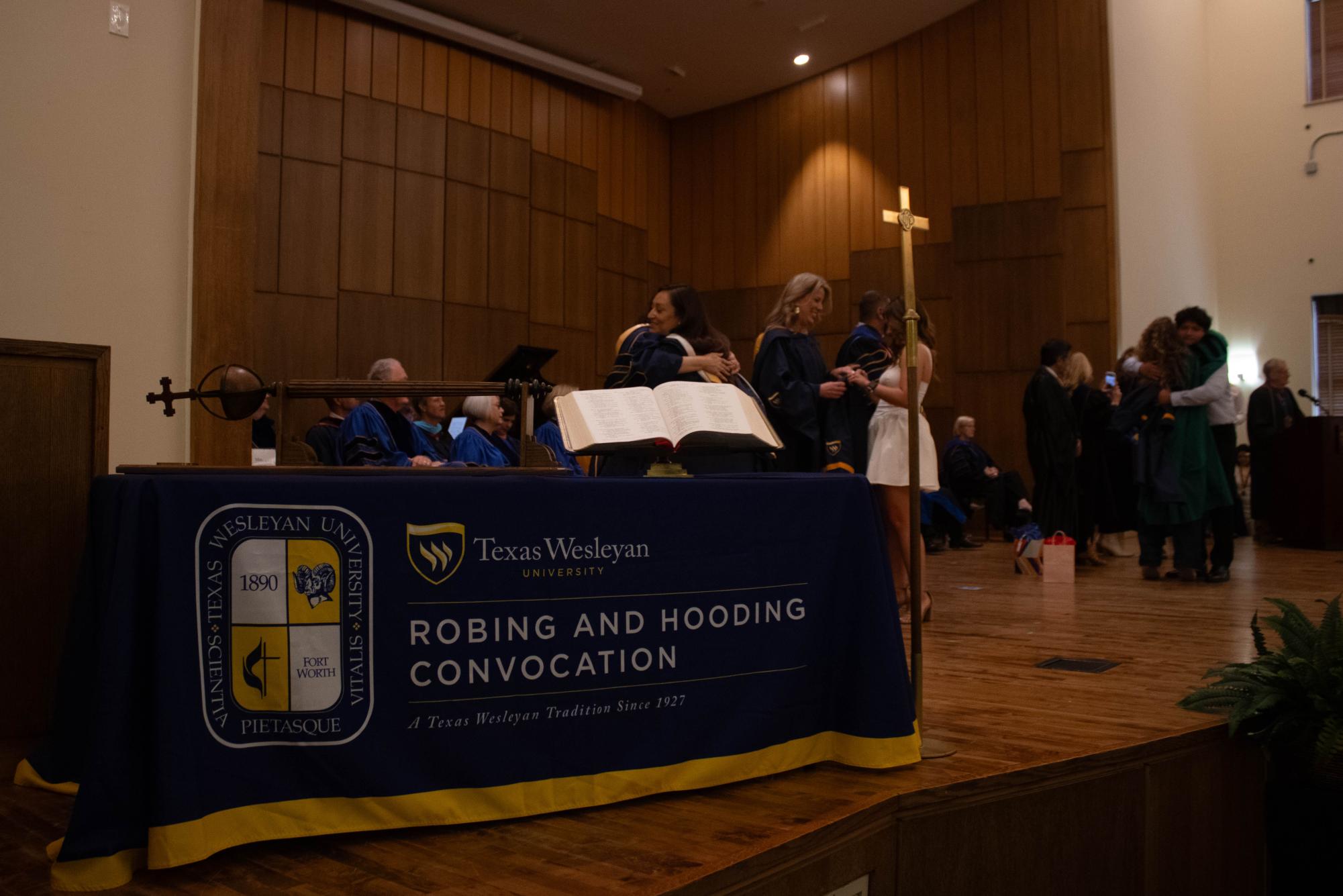 Graduating students embrace new beginnings at Robing and Hooding Ceremony
