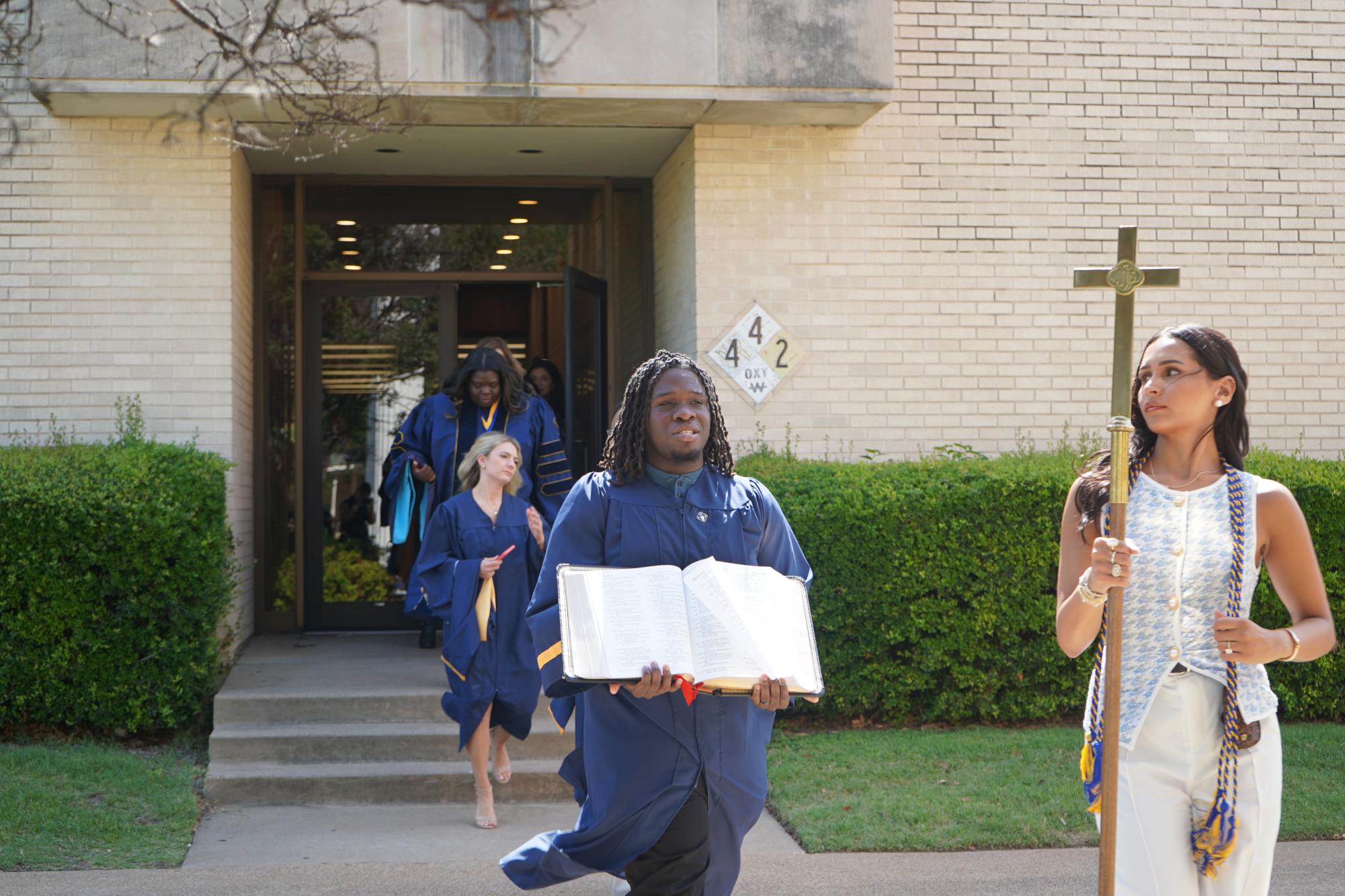 Graduating students embrace new beginnings at Robing and Hooding Ceremony