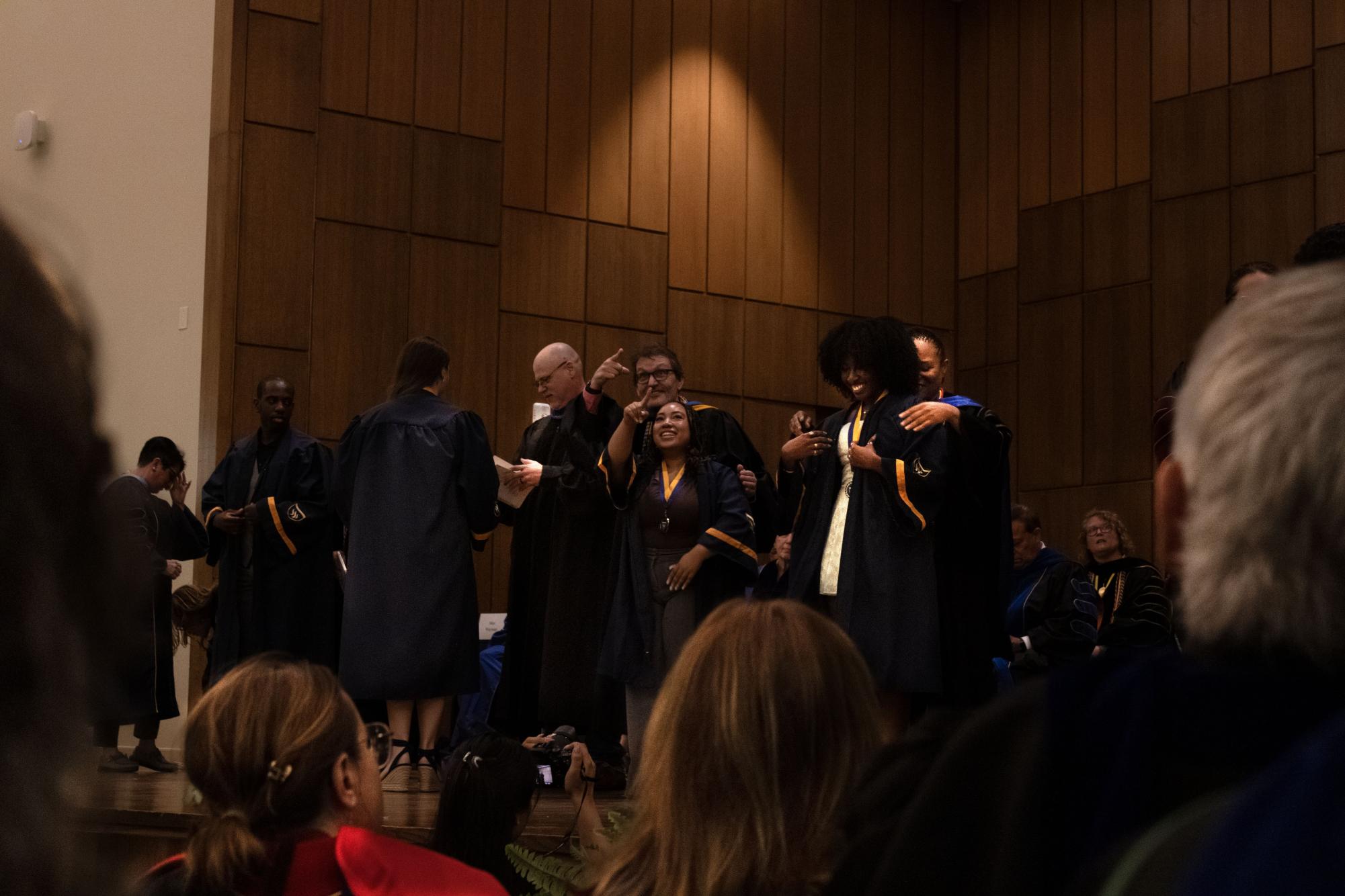 Graduating students embrace new beginnings at Robing and Hooding Ceremony