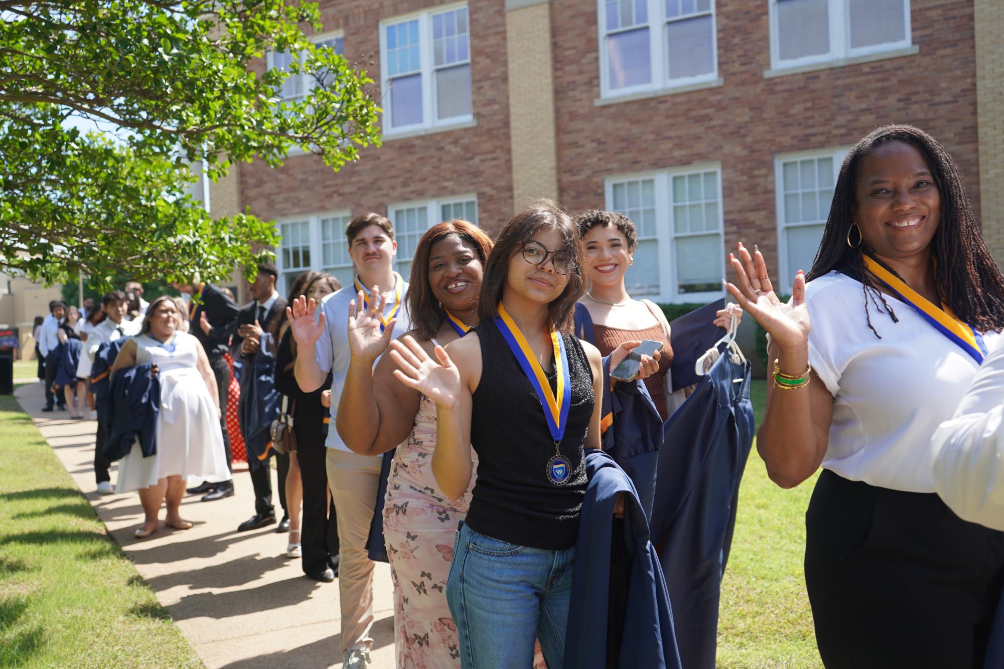 Graduating students embrace new beginnings at Robing and Hooding Ceremony