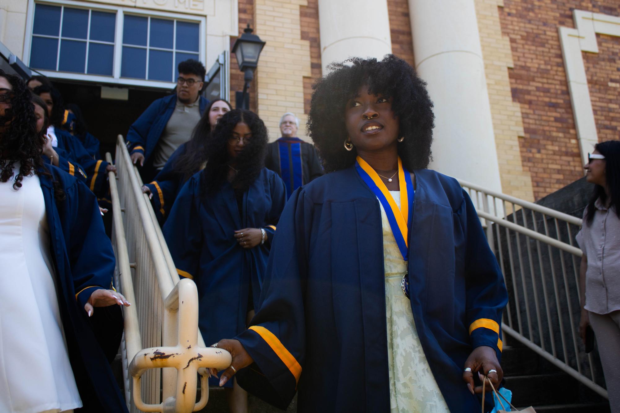 Graduating students embrace new beginnings at Robing and Hooding Ceremony