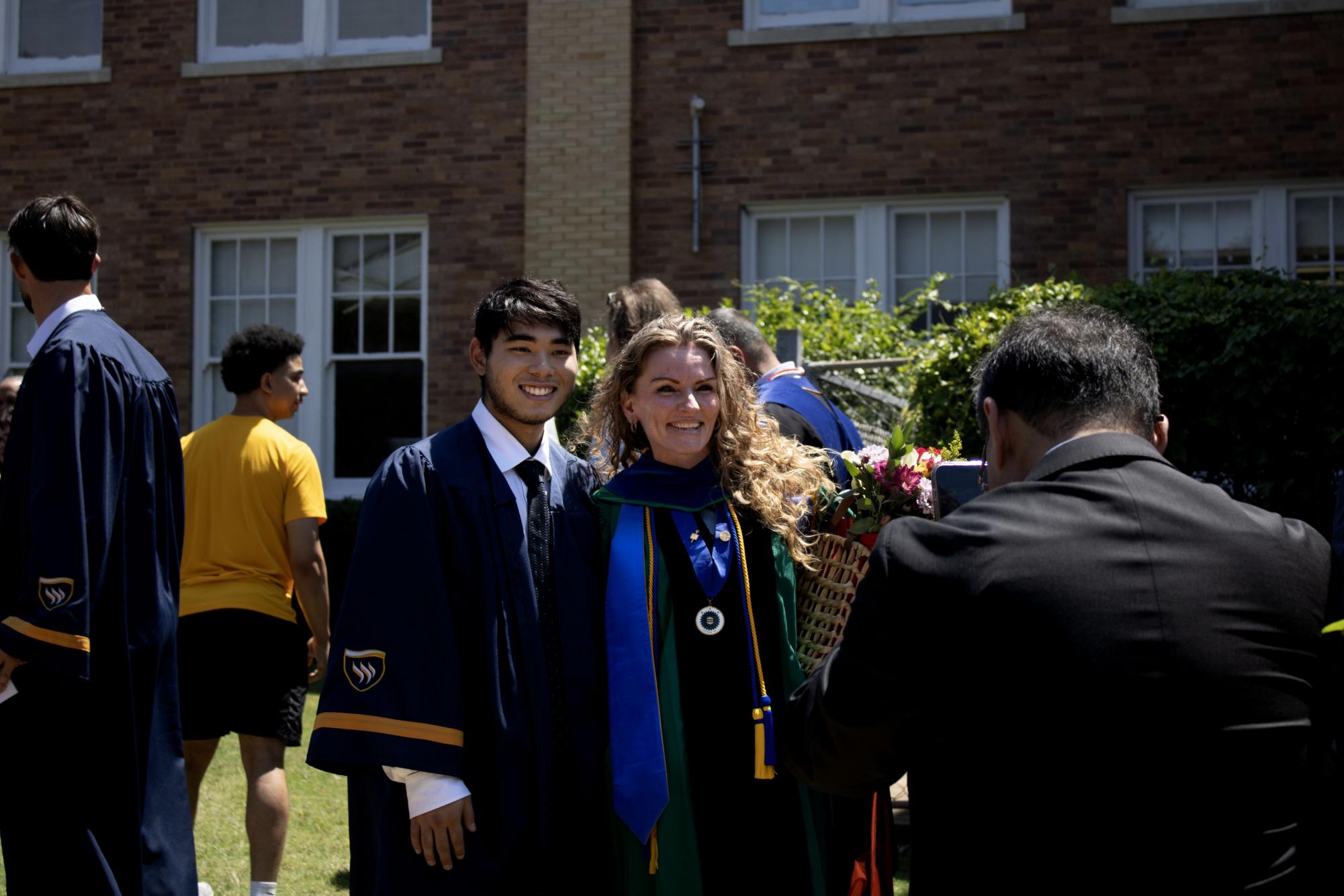 Graduating students embrace new beginnings at Robing and Hooding Ceremony